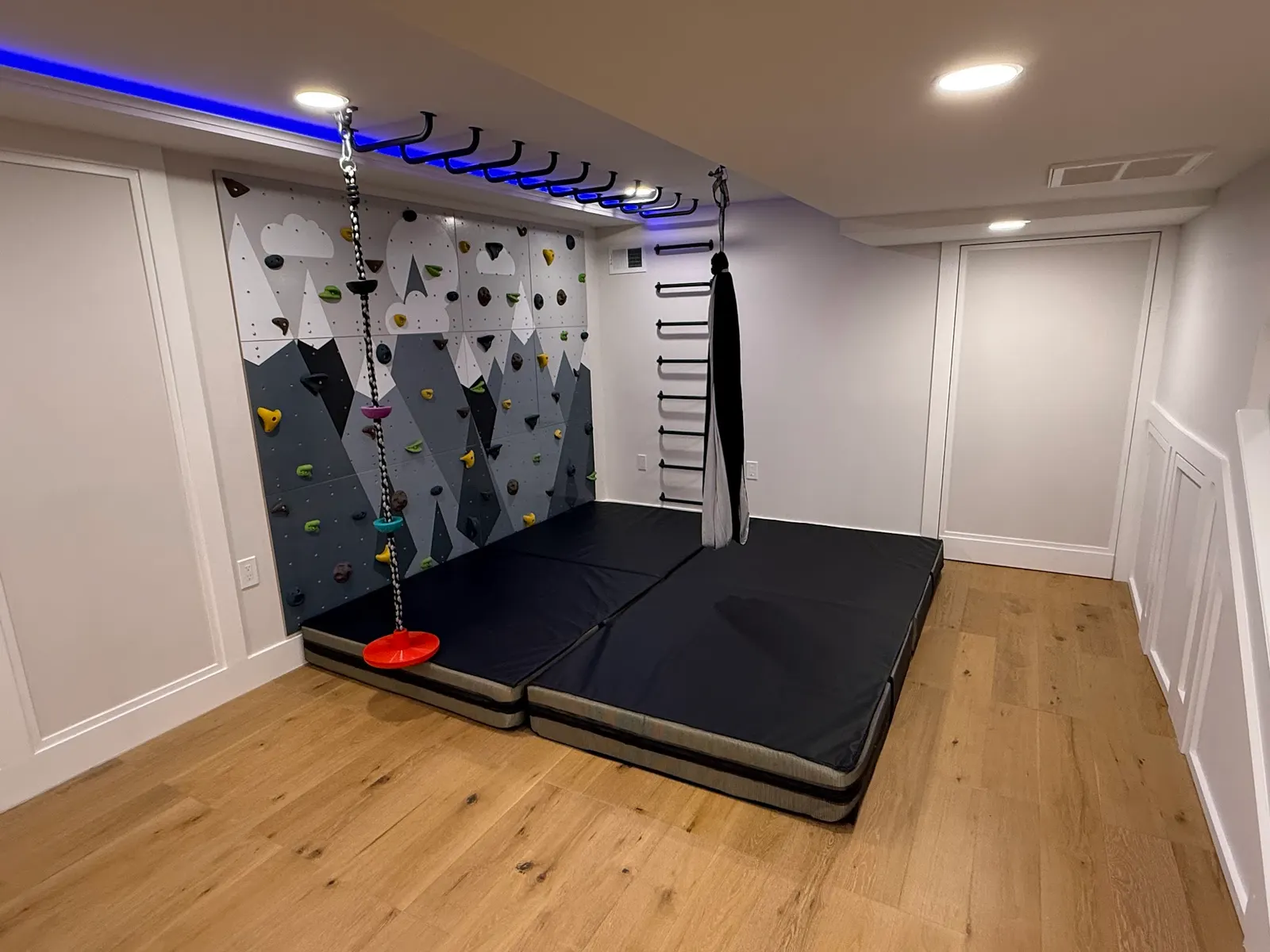 Basement kids climbing wall and play area