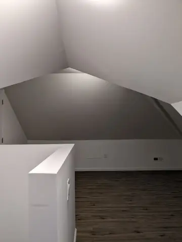 Finished attic with sloped ceiling