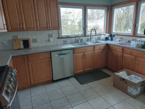 Kitchen with oak cabinets before the remodel